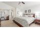 Bright bedroom with ensuite bath and walk-in closet at 14374 W Amelia Ave, Goodyear, AZ 85395