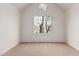 Bedroom boasts vaulted ceilings, a round window, and plush carpet flooring at 1535 N Horne -- # 35, Mesa, AZ 85203