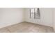 Bright bedroom with tile floor and window with blinds at 1535 N Horne -- # 35, Mesa, AZ 85203