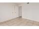 Bright bedroom with tile floor and closet with doors ajar at 1535 N Horne -- # 35, Mesa, AZ 85203