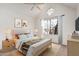Sunlit bedroom with vaulted ceilings, a round window, and plush bedding for a relaxing retreat at 1535 N Horne -- # 35, Mesa, AZ 85203