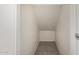 A walk-in closet featuring tile flooring and rod for hangers at 1535 N Horne -- # 35, Mesa, AZ 85203