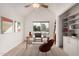 Bright home office with vaulted ceilings, built-in shelving, and ample natural light, perfect for productivity at 1535 N Horne -- # 35, Mesa, AZ 85203
