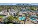Desirable home with large yard, stunning pool, and lush landscaping, captured from an aerial perspective at 15430 N 51St Pl, Scottsdale, AZ 85254