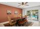 Inviting dining room features seating for six, view of outdoor pool area, and decorative wine art at 15430 N 51St Pl, Scottsdale, AZ 85254