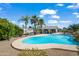 Backyard features beautiful pool with mature trees and desert landscaping at 15430 N 51St Pl, Scottsdale, AZ 85254