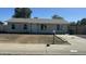 Charming single-story home with a well-maintained exterior and a partially xeriscaped front yard at 1615 W Michelle Dr, Phoenix, AZ 85023
