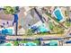 Backyard paradise featuring a sparkling pool, hot tub, and lush landscaping, perfect for relaxation and outdoor enjoyment at 1853 W Estrella Dr, Chandler, AZ 85224