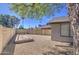 Well maintained backyard, featuring a gravel landscape, and privacy fence at 1853 W Estrella Dr, Chandler, AZ 85224