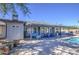 Rear exterior view of home showcasing the large patio, beautiful pool and well-maintained yard at 1853 W Estrella Dr, Chandler, AZ 85224