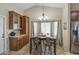 The dining room features lots of natural light and a custom serving bar at 1853 W Estrella Dr, Chandler, AZ 85224