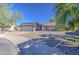 Attractive single-level residence with mature trees, offering a blend of comfort and classic charm and a spacious driveway at 1853 W Estrella Dr, Chandler, AZ 85224
