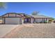 Welcoming single-Gathering home with a tidy gravel yard, featuring a spacious garage and a cozy entryway at 1853 W Estrella Dr, Chandler, AZ 85224