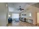 Bright, open living room with plenty of natural light, with vaulted ceiling and wood flooring at 1853 W Estrella Dr, Chandler, AZ 85224