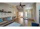 An open concept living room featuring wood floors and high ceilings at 1853 W Estrella Dr, Chandler, AZ 85224
