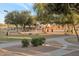Get exercise and fresh air on the community basketball court, surrounded by shady trees and walking paths at 18611 E Raven Dr, Queen Creek, AZ 85142