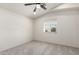 This bedroom has neutral carpet and a window, ready for personalization at 1920 E Belmont Dr, Tempe, AZ 85284