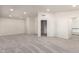 Large bonus room with plush carpet, recessed lighting, and multiple doors for easy access at 1920 E Belmont Dr, Tempe, AZ 85284