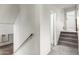 Hallway featuring neutral paint, carpeted floors and stairs, and views of the lower level at 1920 E Belmont Dr, Tempe, AZ 85284