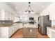 Modern kitchen with stainless steel appliances, granite countertops, and an island at 1920 E Belmont Dr, Tempe, AZ 85284