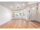 Bright and spacious living room features beautiful hardwood floors and lots of natural light at 1920 E Belmont Dr, Tempe, AZ 85284
