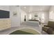Spacious main bedroom with neutral tones, plush carpet, and en-suite bathroom access at 1920 E Belmont Dr, Tempe, AZ 85284