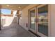 Covered patio with stylish doors overlooking a pool in the backyard at 1920 E Belmont Dr, Tempe, AZ 85284