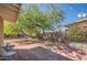 Spacious backyard featuring mature landscaping, string lights, and a comfortable seating area at 2034 N Dayton St, Phoenix, AZ 85006