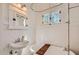 Classic bathroom with a pedestal sink, subway tile, and a soaking tub at 2034 N Dayton St, Phoenix, AZ 85006
