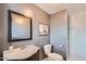 Bathroom featuring updated vanity and shower with modern fixtures and finishes at 2034 N Dayton St, Phoenix, AZ 85006