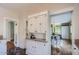 Bright kitchen with white cabinetry, granite countertops, and an open layout at 2034 N Dayton St, Phoenix, AZ 85006