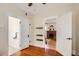 Living space showcasing classic architecture, hardwood floors, and access to bathroom and living room at 2034 N Dayton St, Phoenix, AZ 85006