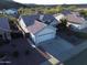 Aerial view of a single-Gathering home featuring a tile roof, desert landscaping, and an attached two-car garage at 20822 N 42Nd. Ave, Glendale, AZ 85308