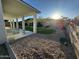 Backyard featuring a covered patio and artificial grass lawn at 20822 N 42Nd. Ave, Glendale, AZ 85308