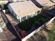 Aerial view of a backyard with artificial turf and a covered patio at 20822 N 42Nd. Ave, Glendale, AZ 85308