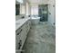 Luxurious bathroom with double vanity, soaking tub, and glass-enclosed shower with gold hardware at 20822 N 42Nd. Ave, Glendale, AZ 85308