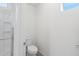 A clean, well lit bathroom with a shower and toilet perfect for a starter Gathering or new construction home at 21572 W Sonora St, Buckeye, AZ 85326
