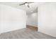 Bright carpeted bedroom with a ceiling fan at 21572 W Sonora St, Buckeye, AZ 85326