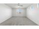 Bright and spacious bedroom filled with light from a large window at 21572 W Sonora St, Buckeye, AZ 85326