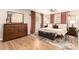 Spacious main bedroom with ample natural light, elegant furnishings, and a cozy rug creating a luxurious feel at 2246 E Glenrosa Ave, Phoenix, AZ 85016