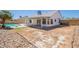Spacious backyard featuring a pool and an expansive dirt area at 2311 N Loma Vis, Mesa, AZ 85213
