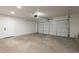 Spacious two car garage, offering ample room for parking and storage at 2311 N Loma Vis, Mesa, AZ 85213