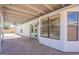 Covered patio, offering shade and seamless access to the pool and backyard at 2311 N Loma Vis, Mesa, AZ 85213