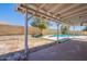Inviting covered patio overlooking the sparkling pool at 2311 N Loma Vis, Mesa, AZ 85213