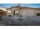 Charming single-story home with desert landscaping, gravel, stone, and a well-manicured walkway leading to the front door at 2537 E Vista Bonita Dr, Phoenix, AZ 85024
