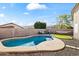 Private backyard oasis with a sparkling pool, lounge area, and well-maintained landscaping at 2537 E Vista Bonita Dr, Phoenix, AZ 85024
