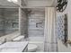 Bright bathroom with a tub/shower combo and updated vanity at 2537 E Vista Bonita Dr, Phoenix, AZ 85024