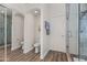 Bathroom with dual mirrors, shower, and toilet at 2537 E Vista Bonita Dr, Phoenix, AZ 85024