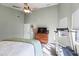 A bedroom featuring a ceiling fan, natural light, and a comfortable bed at 2537 E Vista Bonita Dr, Phoenix, AZ 85024