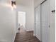 Hallway with neutral walls and wood-look floors at 2537 E Vista Bonita Dr, Phoenix, AZ 85024